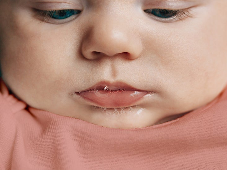 Baby Spitting Up Clear Liquid What It Means and When to Seek Medical