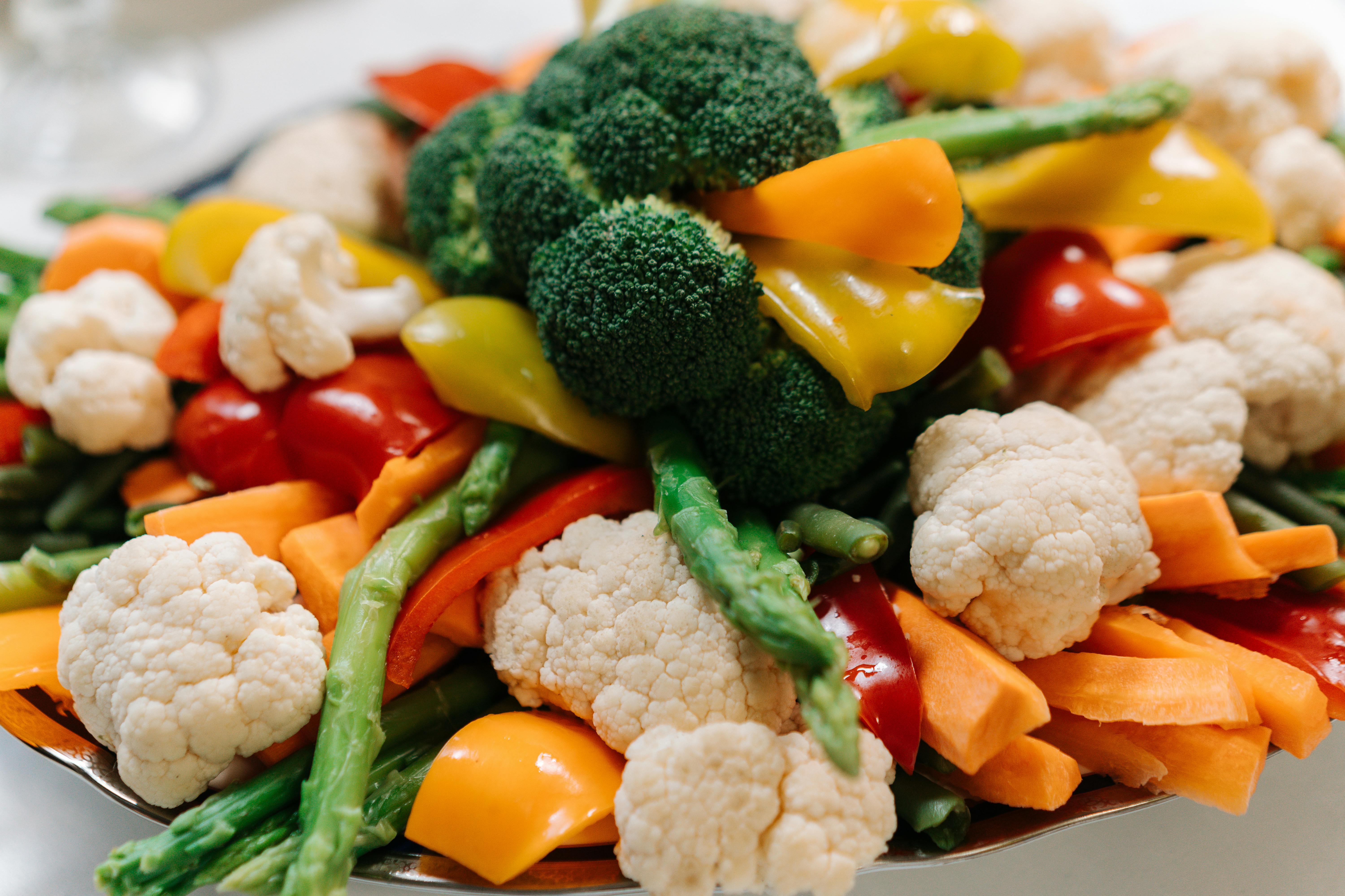 A vibrant assortment of fresh vegetables including broccoli, asparagus, and bell peppers.